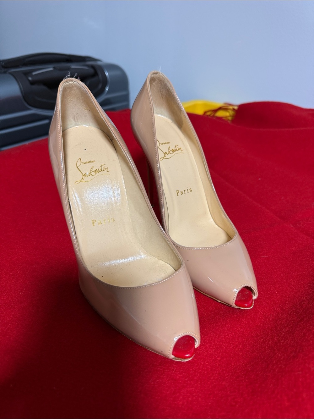 Christian Louboutin Nude Patent Peep-Toe Pumps with Red Soles